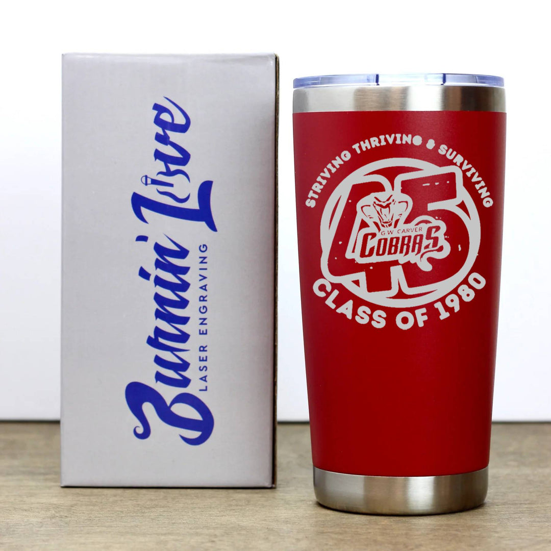 Red tumbler with engraved logo and text next to a white box with blue text on a light gray background