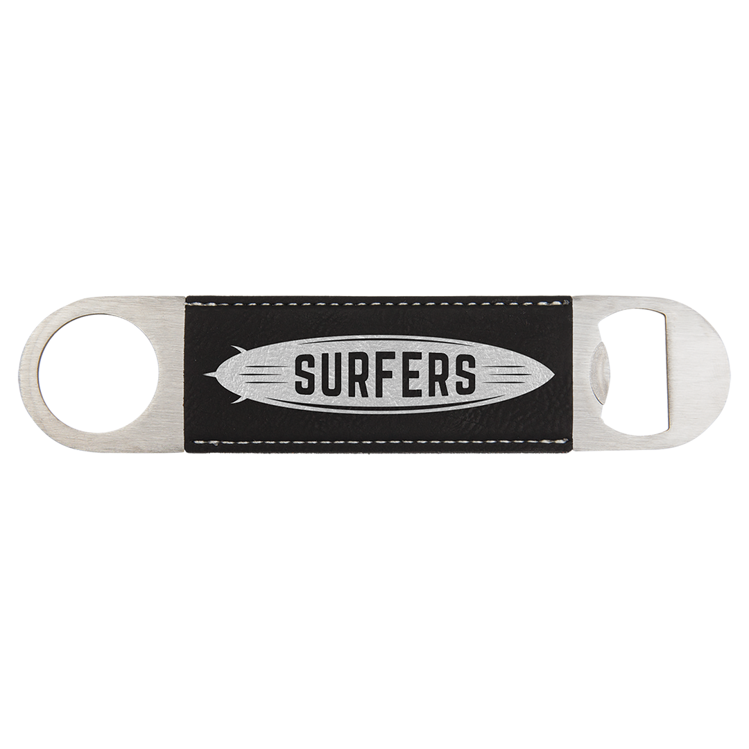 a black and white surfboard with the words surfers on it
