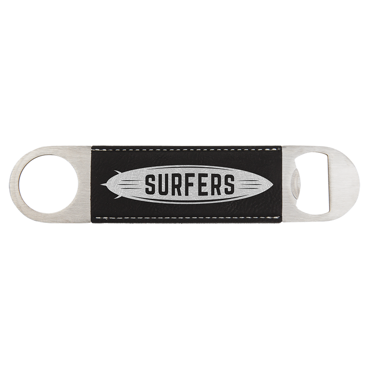 a black and white surfboard with the words surfers on it